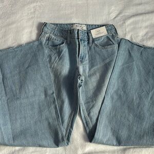 light wash blue jeans wide leg low rise